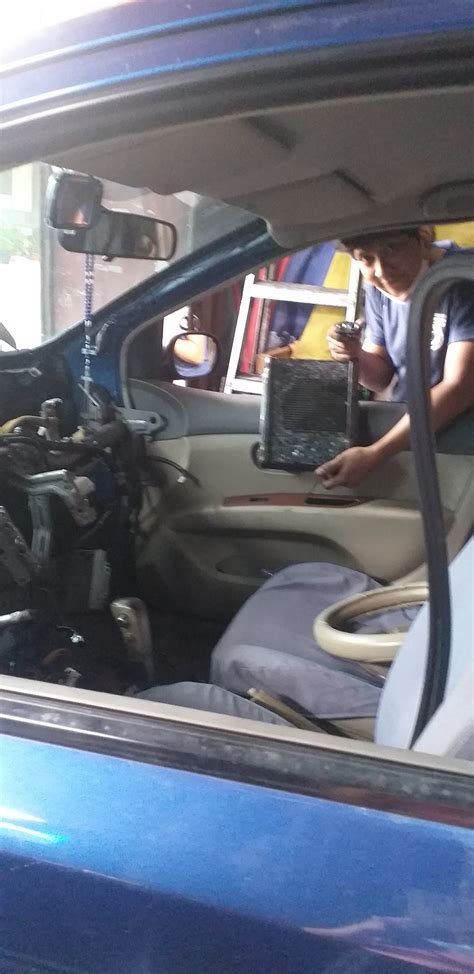 W. AGBUYA CAR AIRCON .